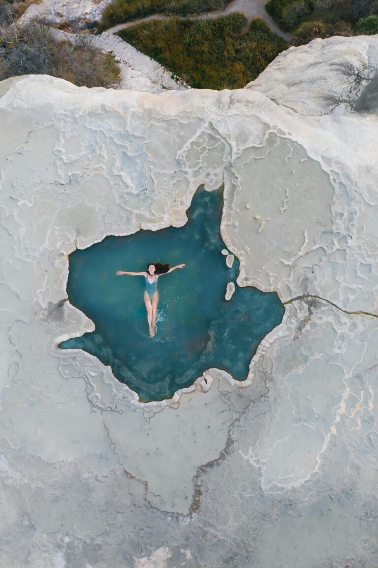 lady in a cliff lagoon pool